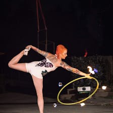 Hannah dances with a flaming hula hoop
