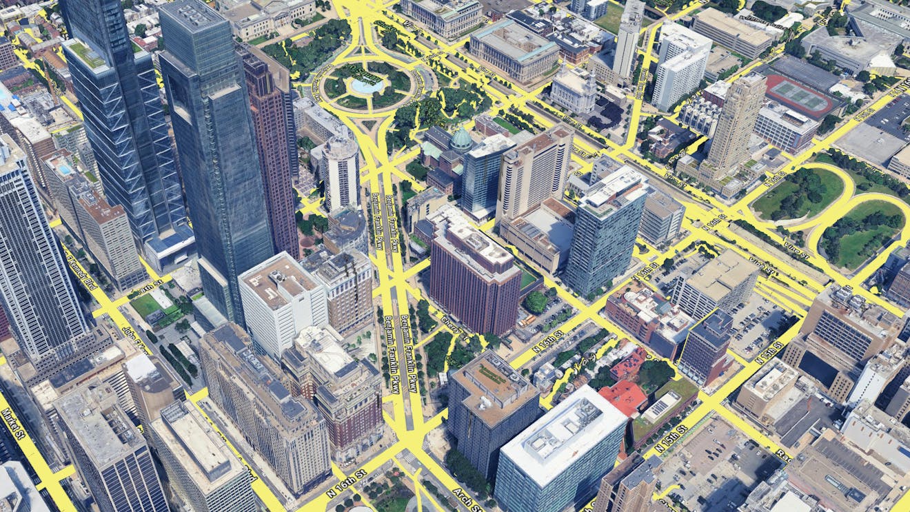 An example of draping imagery on 3D Tiles: Google Photorealistic 3D Tiles with Google Roadmap Tile overlay.
