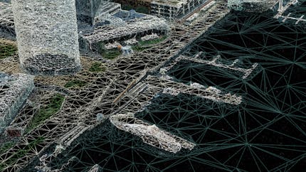 A wireframe view of a portion of Melbourne. Notice the variation in triangle size and density: The buildings (upper left) have small and densely packed triangles, while the triangles that make up the river (lower right) are much larger.
