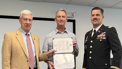 Wes Craig, Danny Williams, and Brady Moore during the award ceremony.