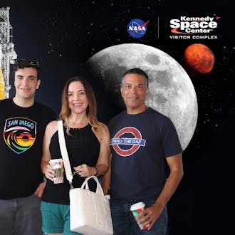 Chris Andrews (right), his wife (center), and son (left)