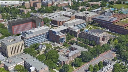 Engineering model for a new building at Penn State University surrounded by a reality model of the campus, 2017.